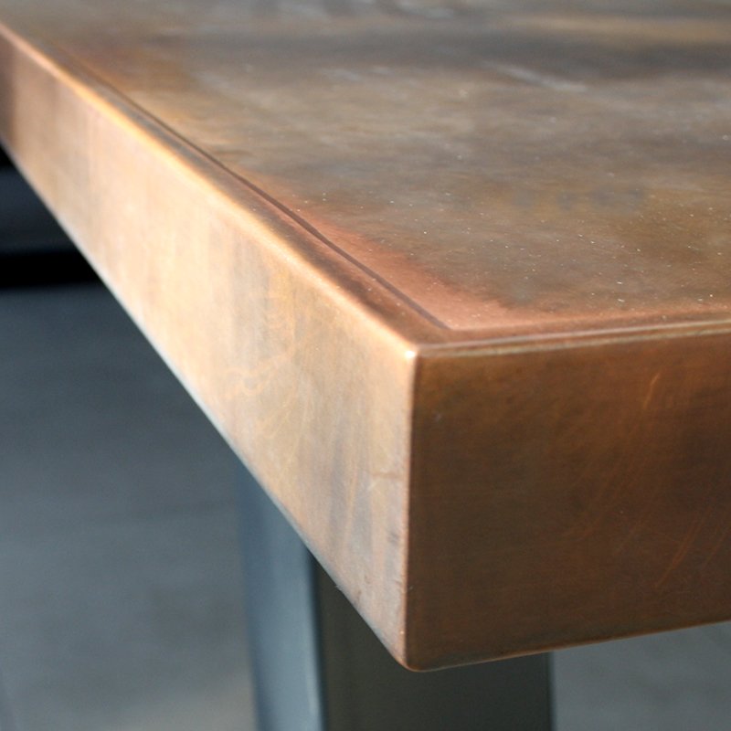 Aged copper table with edge finish Aged copper table with edge finish